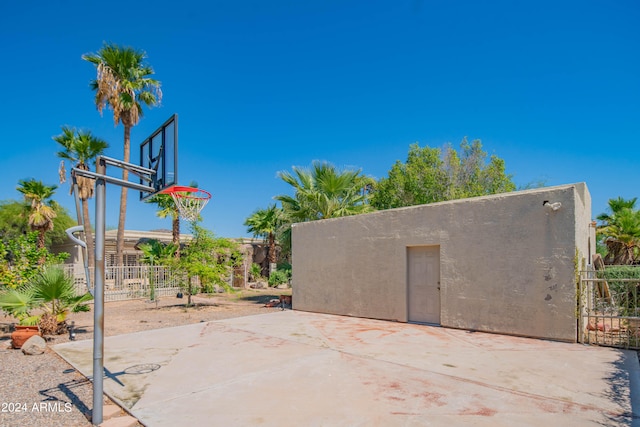 view of patio with basketball court