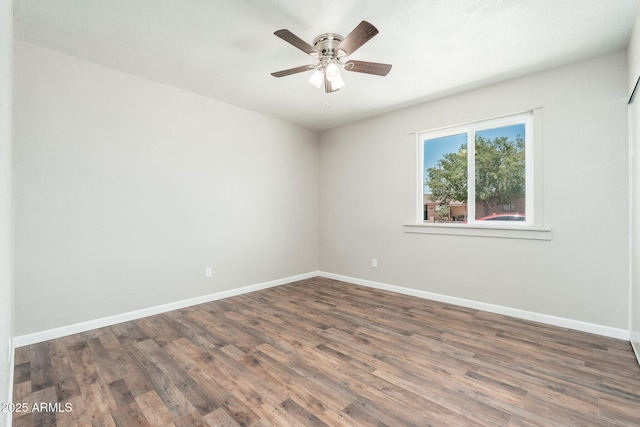 6223 W Earll Dr, Phoenix, AZ 85033 - spare room with wood finished floors and ceiling fan
