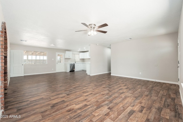 6223 W Earll Dr, Phoenix, AZ 85033 - unfurnished living room featuring a ceiling fan, dark wood-type flooring, and recessed lighting
