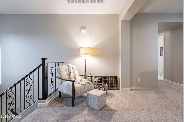 living area with carpet flooring