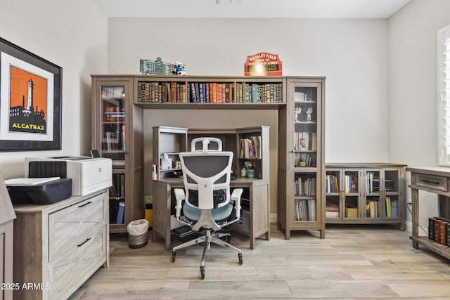 office area featuring visible vents and wood finished floors