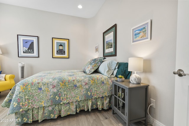 bedroom featuring recessed lighting, baseboards, and wood finished floors