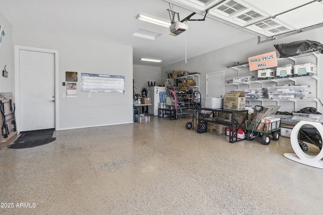 garage featuring a garage door opener