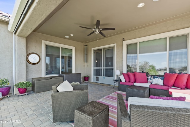 view of patio / terrace featuring ceiling fan and an outdoor hangout area