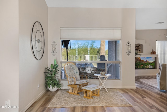 sitting room featuring hardwood / wood-style flooring