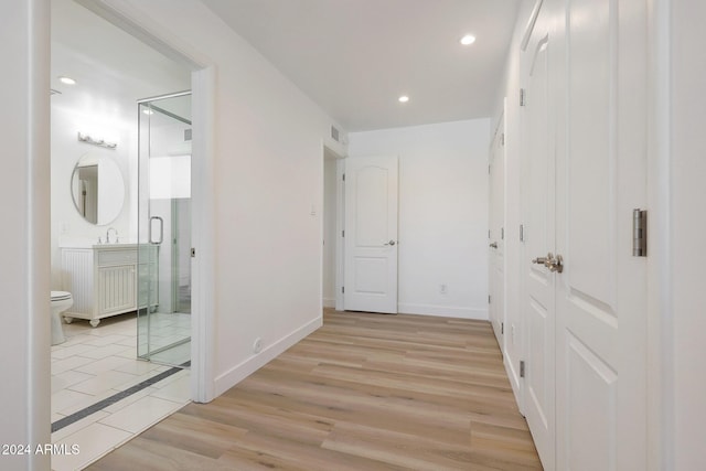 hall featuring light hardwood / wood-style flooring