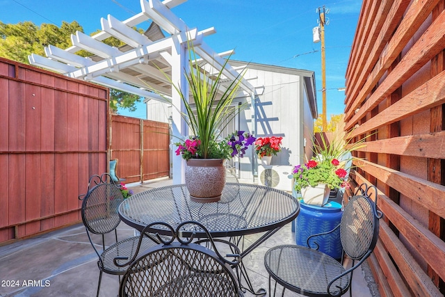 view of patio / terrace featuring a pergola