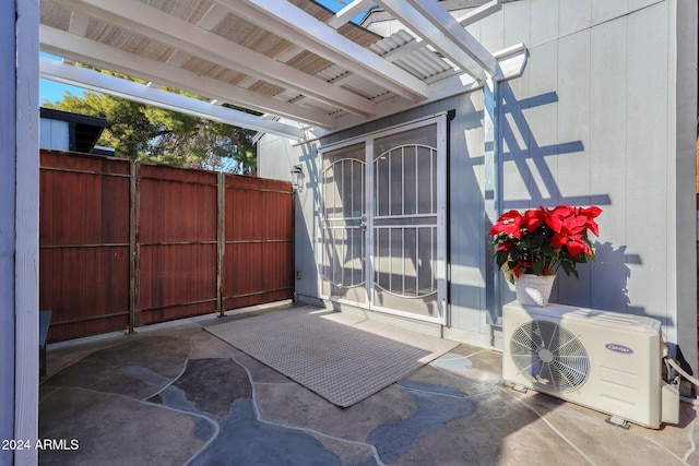 view of patio featuring ac unit