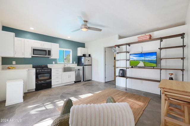 living room with ceiling fan, sink, and concrete flooring