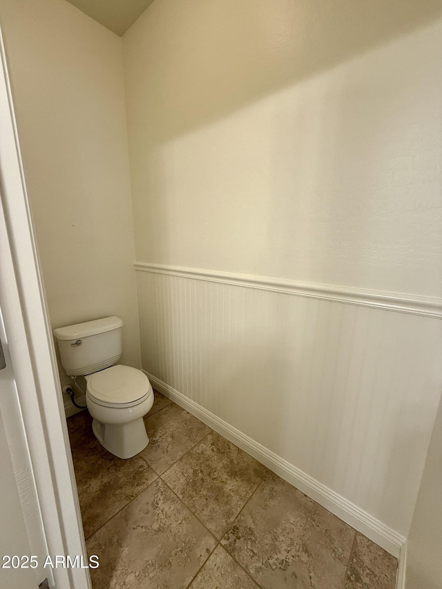 bathroom featuring toilet