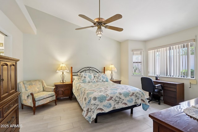 2055 N 56th St Unit 15, Mesa, AZ 85215 - bedroom featuring multiple windows, vaulted ceiling, an office area, and ceiling fan
