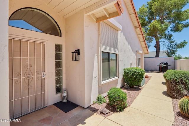 2055 N 56th St Unit 15, Mesa, AZ 85215 - doorway to property with stucco siding