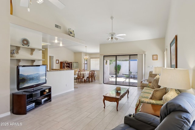 2055 N 56th St Unit 15, Mesa, AZ 85215 - living room with ceiling fan, light wood-style floors, and vaulted ceiling