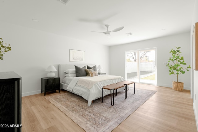 bedroom with access to outside, ceiling fan, and light hardwood / wood-style floors