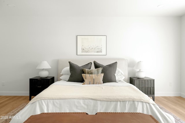 bedroom featuring hardwood / wood-style flooring