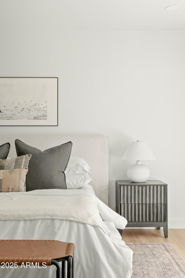 bedroom featuring light hardwood / wood-style floors