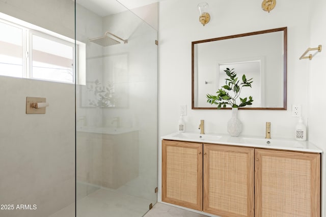 bathroom featuring vanity and tiled shower