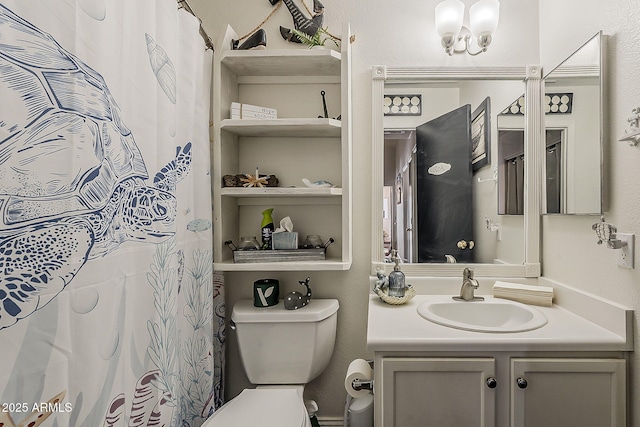 full bathroom with vanity and toilet