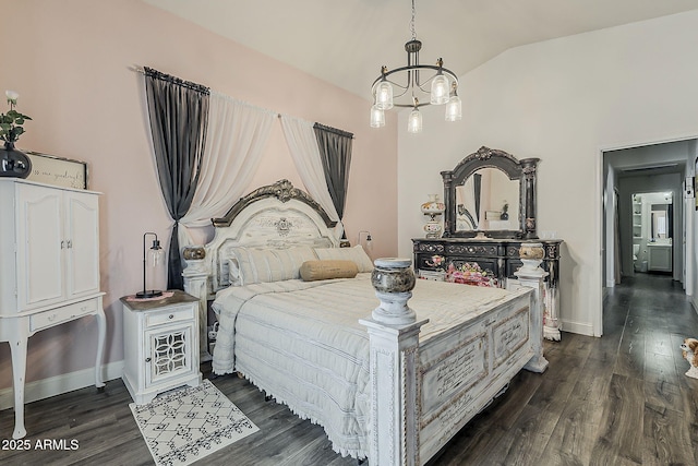 bedroom featuring baseboards, lofted ceiling, and dark wood-style floors
