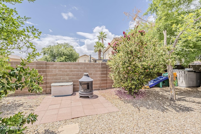view of patio / terrace featuring fence