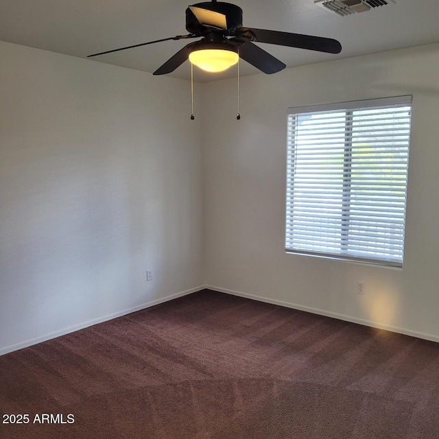 6908 S 8th Dr, Phoenix, AZ 85041 - unfurnished room featuring a ceiling fan, visible vents, and dark colored carpet