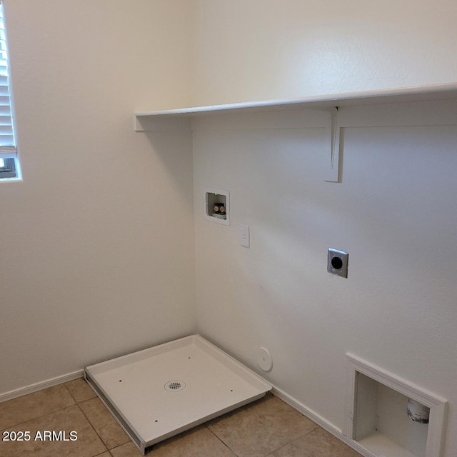 6908 S 8th Dr, Phoenix, AZ 85041 - laundry area with laundry area, hookup for a washing machine, gas dryer hookup, electric dryer hookup, and light tile patterned floors