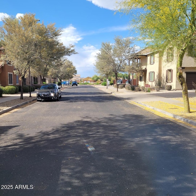 6908 S 8th Dr, Phoenix, AZ 85041 - view of road with a residential view, sidewalks, and curbs