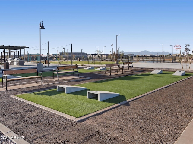 surrounding community with a mountain view