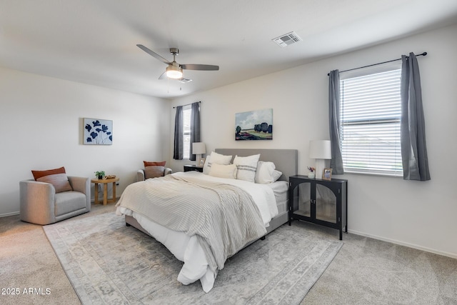 17728 W Paraiso Dr, Surprise, AZ 85387 - bedroom with light carpet, ceiling fan, and baseboards
