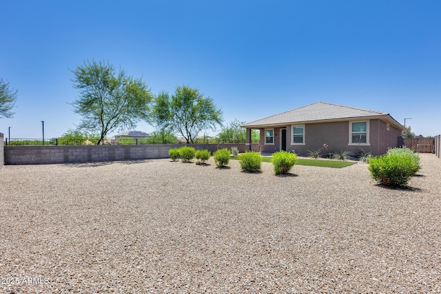 17728 W Paraiso Dr, Surprise, AZ 85387 - rear view of property with a fenced backyard and a tile roof