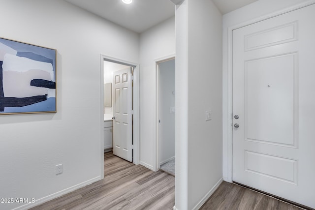 17728 W Paraiso Dr, Surprise, AZ 85387 - hall with light wood-type flooring and baseboards