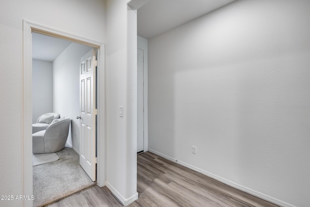 17728 W Paraiso Dr, Surprise, AZ 85387 - corridor featuring wood finished floors and baseboards