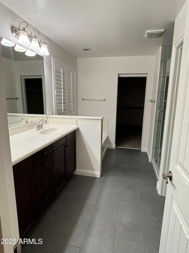 3480 E Sheffield Rd, Gilbert, AZ 85296 - bathroom with vanity, tile patterned floors, and a shower stall