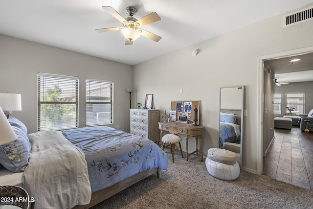 carpeted bedroom with ceiling fan