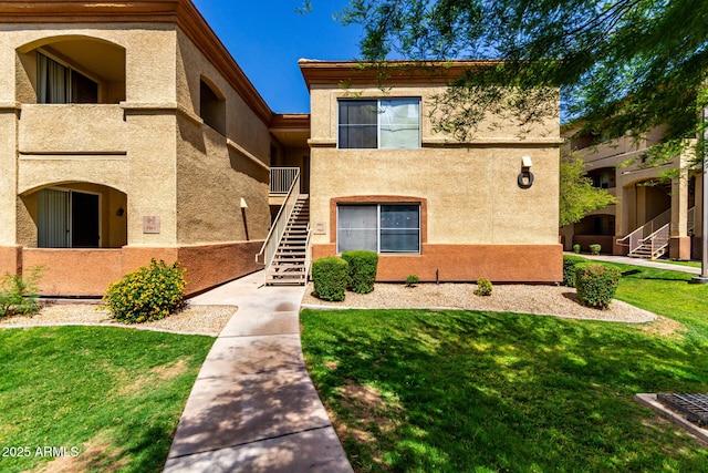2134 E Broadway Rd Unit 1062, Tempe, AZ 85282 - view of property featuring stairway