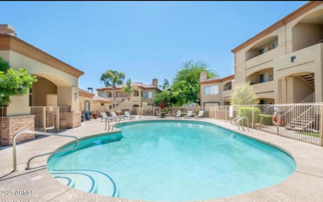 2134 E Broadway Rd Unit 1062, Tempe, AZ 85282 - community pool with fence and a patio
