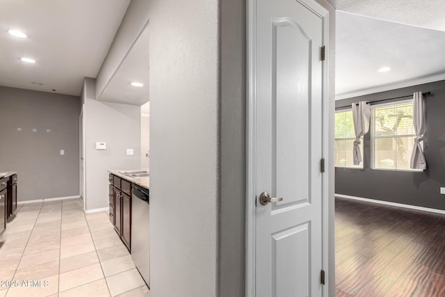 2134 E Broadway Rd Unit 1062, Tempe, AZ 85282 - corridor featuring baseboards, recessed lighting, and light tile patterned floors