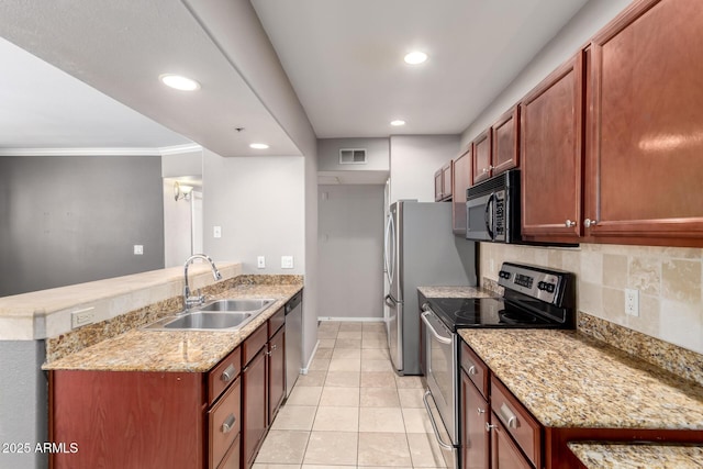 2134 E Broadway Rd Unit 1062, Tempe, AZ 85282 - kitchen featuring appliances with stainless steel finishes, a sink, a peninsula, tasteful backsplash, and recessed lighting