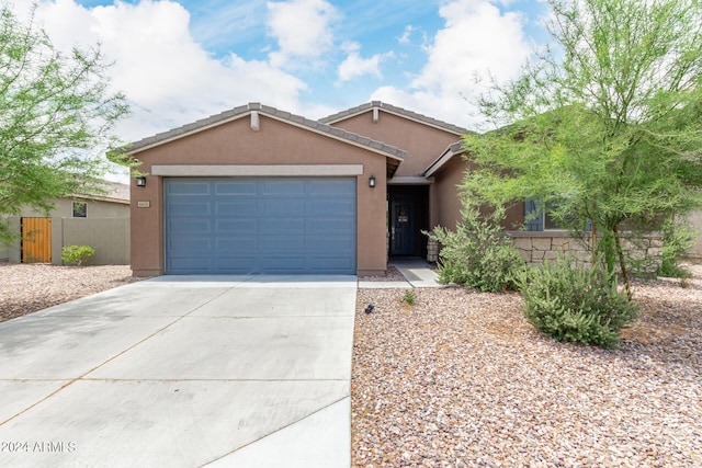 single story home featuring a garage