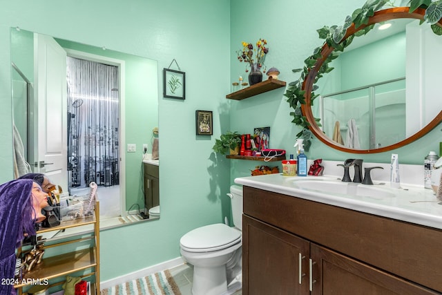 full bathroom with tile patterned floors, vanity, toilet, and enclosed tub / shower combo