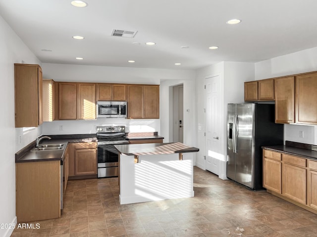 1737 W Hopi Dr, Coolidge, AZ 85128 - kitchen featuring appliances with stainless steel finishes and sink