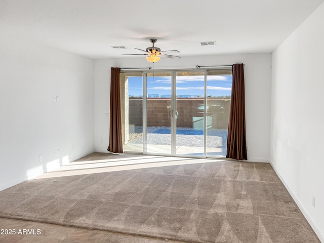 1737 W Hopi Dr, Coolidge, AZ 85128 - unfurnished room with carpet flooring and ceiling fan