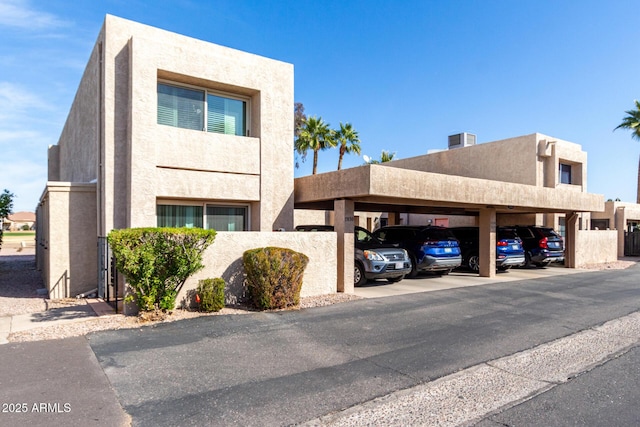 exterior space featuring a carport