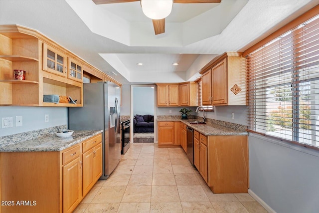 8545 E Heatherbrae Dr, Scottsdale, AZ 85251 - kitchen with a tray ceiling, a sink, stainless steel fridge, dishwasher, and a ceiling fan