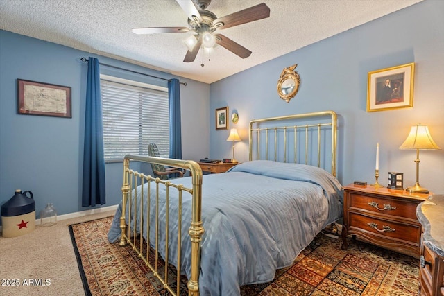 8545 E Heatherbrae Dr, Scottsdale, AZ 85251 - carpeted bedroom featuring a textured ceiling, ceiling fan, and baseboards