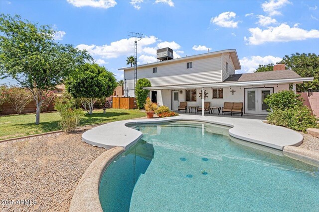 8545 E Heatherbrae Dr, Scottsdale, AZ 85251 - view of pool with a patio area, french doors, and central air condition unit