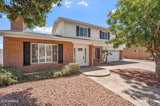 8545 E Heatherbrae Dr, Scottsdale, AZ 85251 - traditional home with brick siding, driveway, and a garage