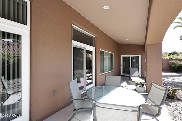 view of patio featuring outdoor dining space