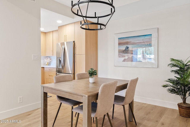 9708 E Via Linda Rd Unit 1350, Scottsdale, AZ 85258 - dining area featuring baseboards, light wood-style flooring, and recessed lighting