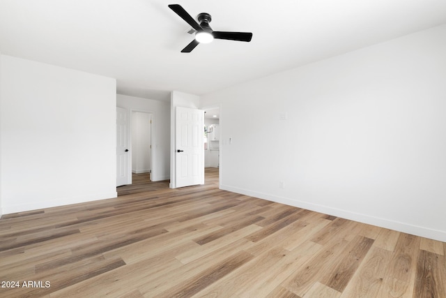 unfurnished bedroom featuring light wood-type flooring and ceiling fan